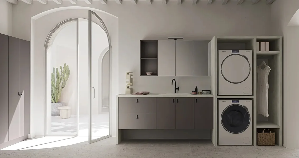 Mobile lavanderia grigio con porta ad arco